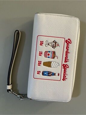 Coach zip-around wallet in cream pebbled leather and boardwalk treat print